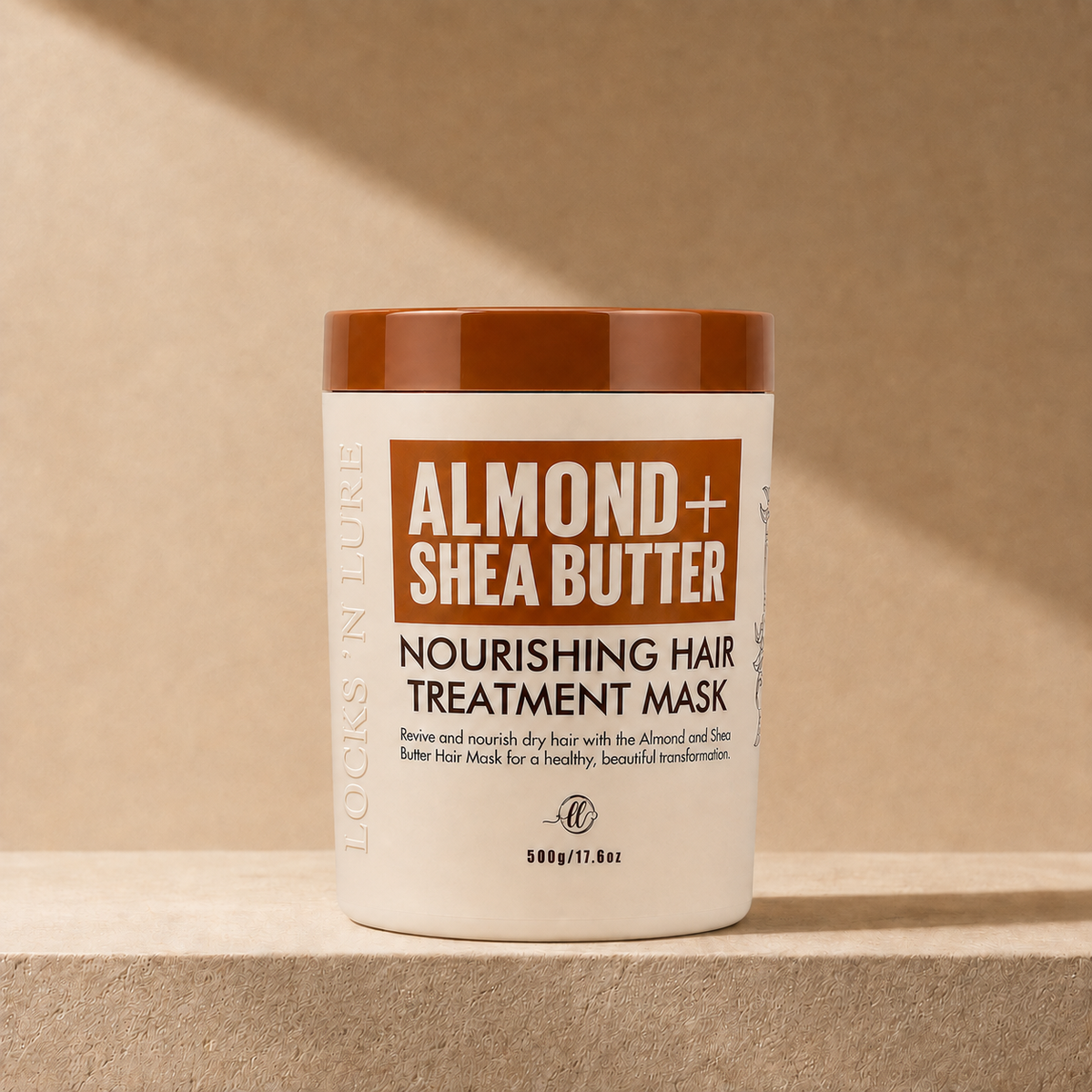 A white plastic jar of ALMOND + SHEA BUTTER NOURISHING HAIR TREATMENT MASK with a brown lid, set on a beige stone surface with warm, directional sunlight casting soft shadows.