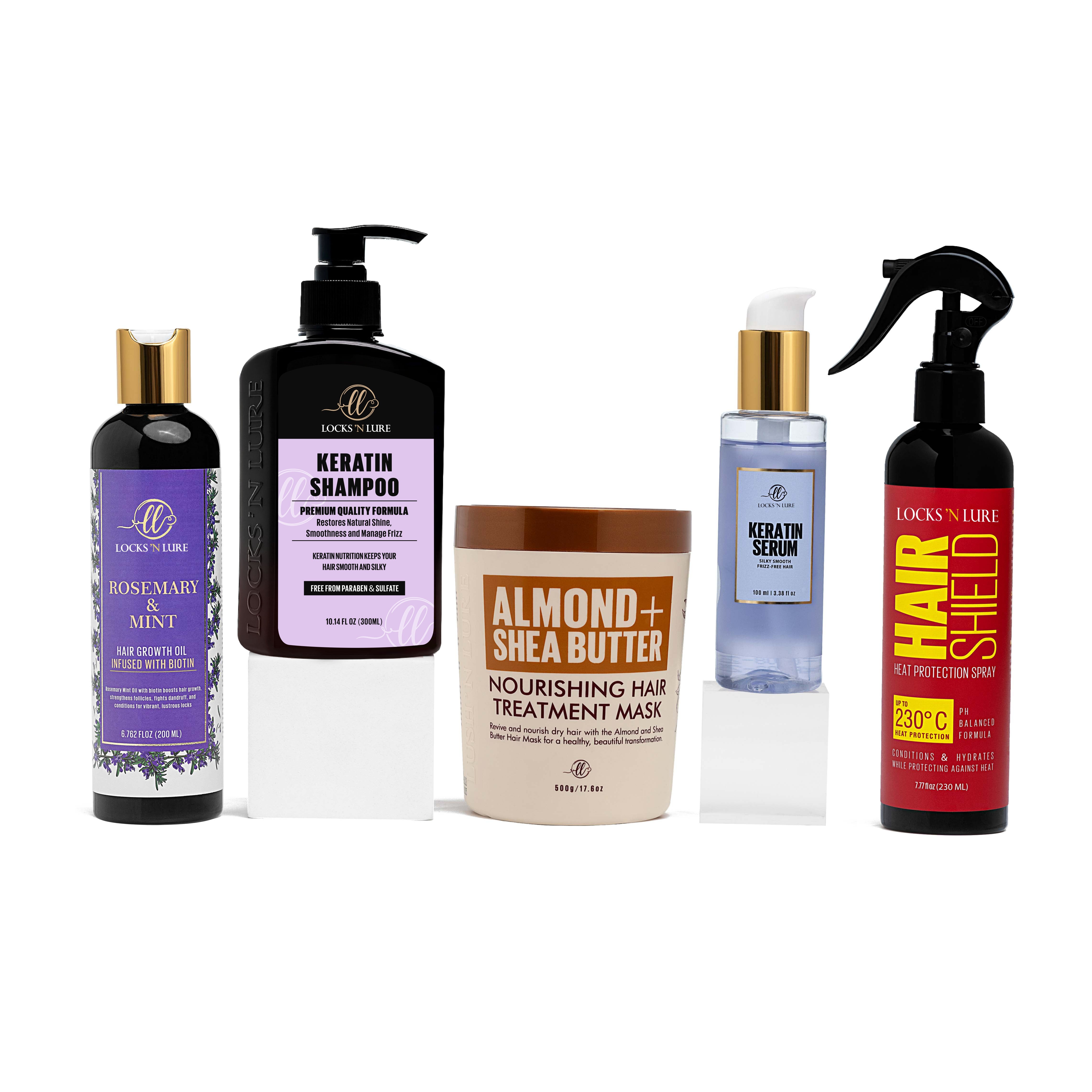 Set of hair care products including shampoo, mask, serum, and spray on a white background