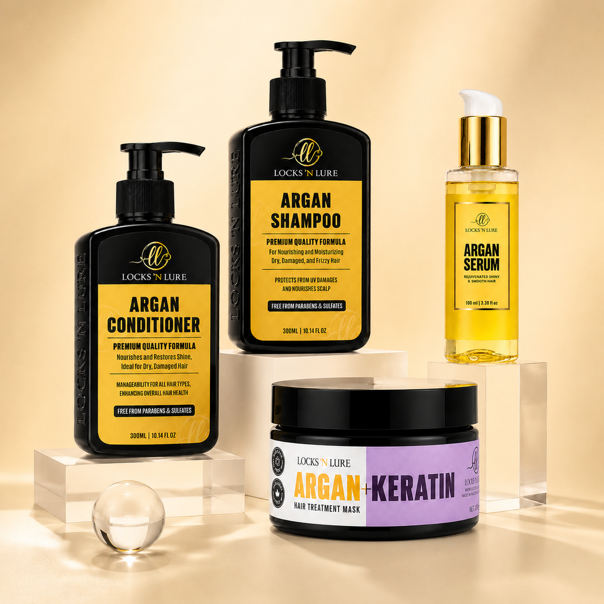 Four Lock's Lore haircare products arranged on acrylic blocks against a warm beige studio background: Argan Conditioner, Argan Shampoo, Argan Serum, and an Argan-Keratin hair treatment mask jar.