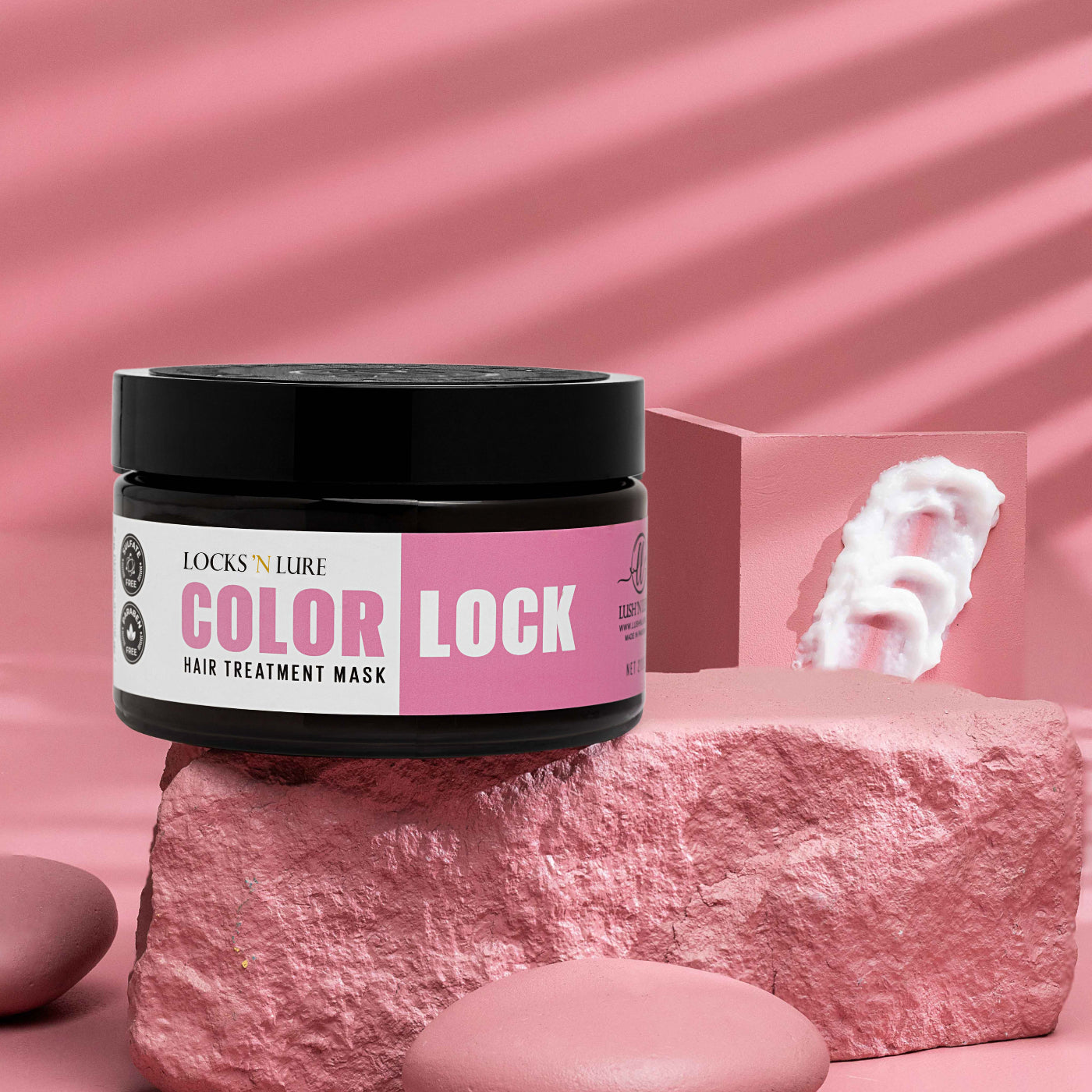 Jar of 'Color Lock' hair treatment mask on a pink background