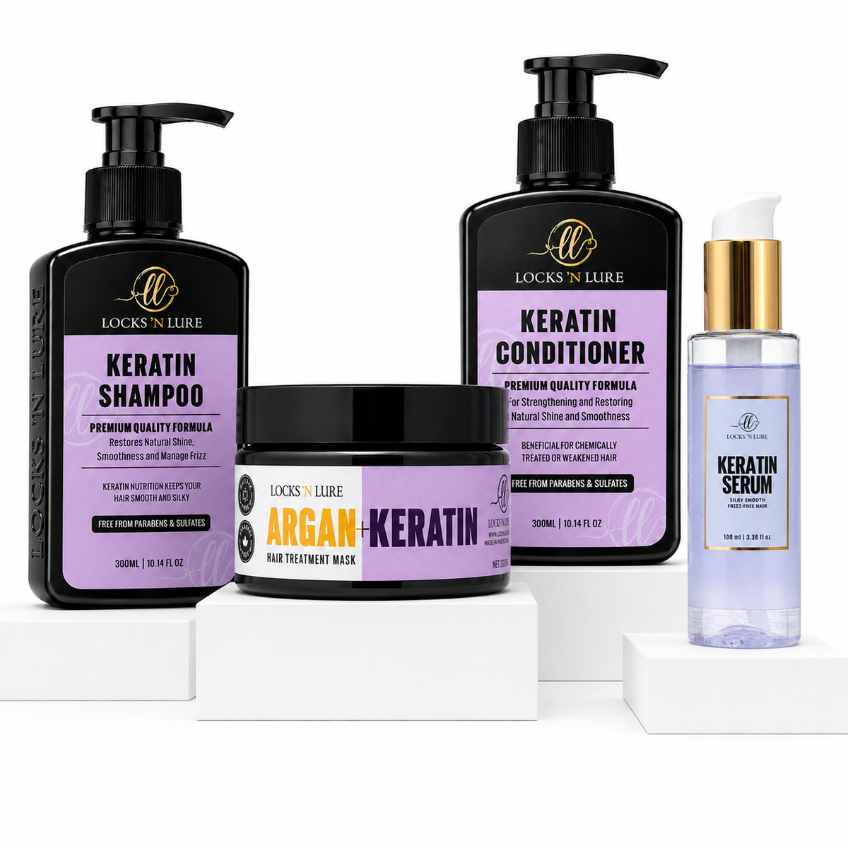 A hair care set from Locks 'N Lure displayed on white pedestals against a white background. The set includes a Keratin Shampoo bottle, a Keratin Conditioner bottle, an Argan-Keratin Hair Treatment Mask jar, and a Keratin Serum bottle with a gold cap.