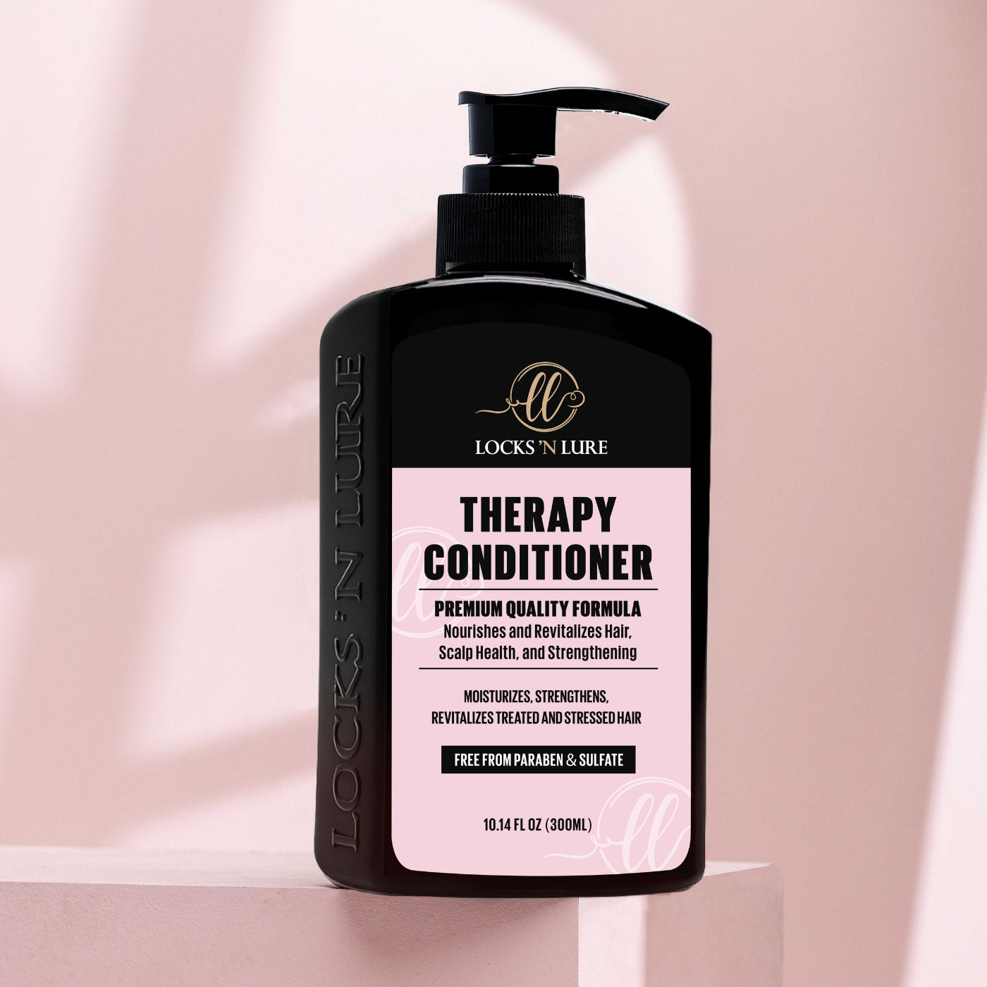 Locks 'N Lure Therapy Conditioner bottle on a light pink background